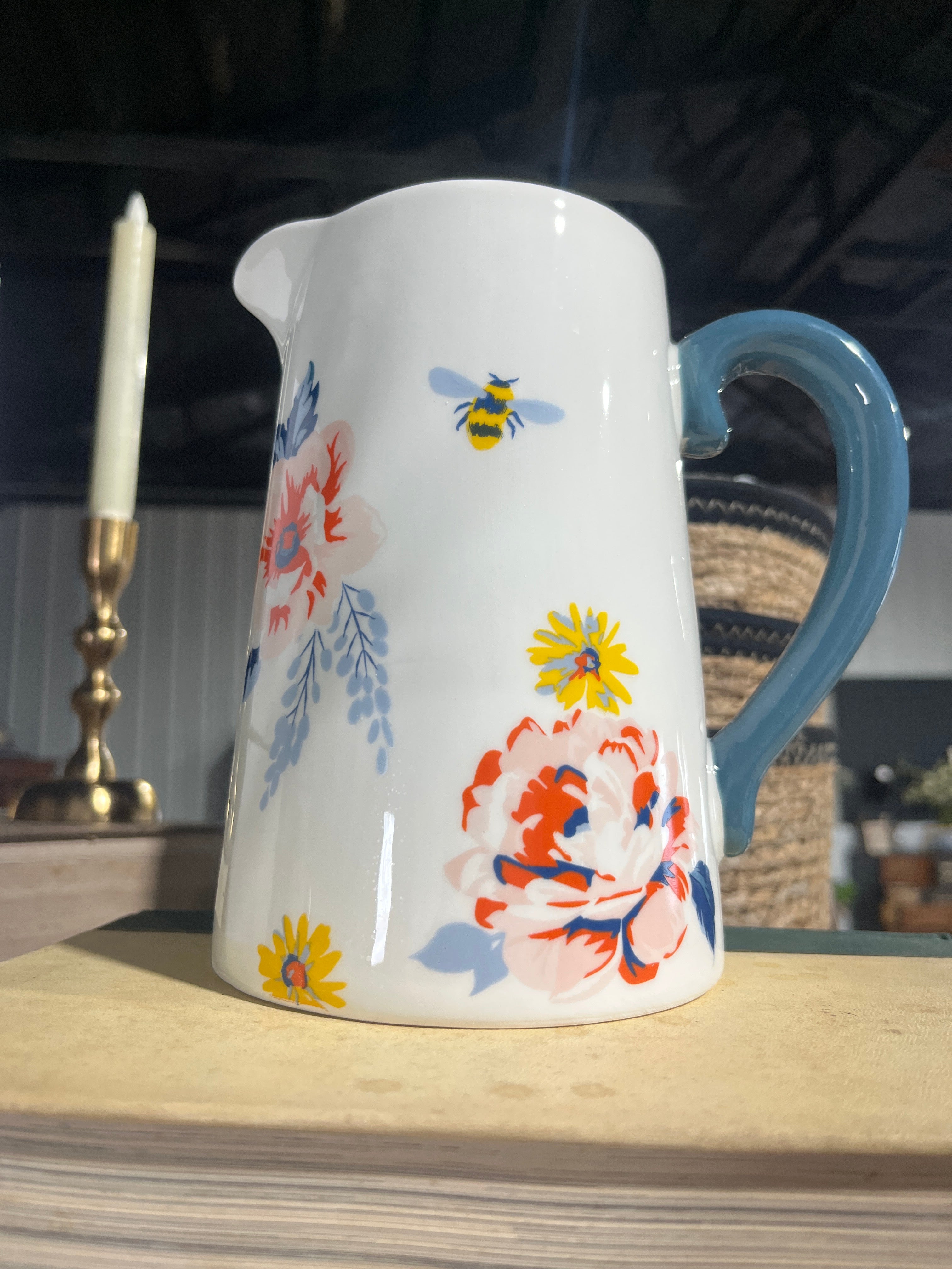 Blue floral ceramic pitcher
