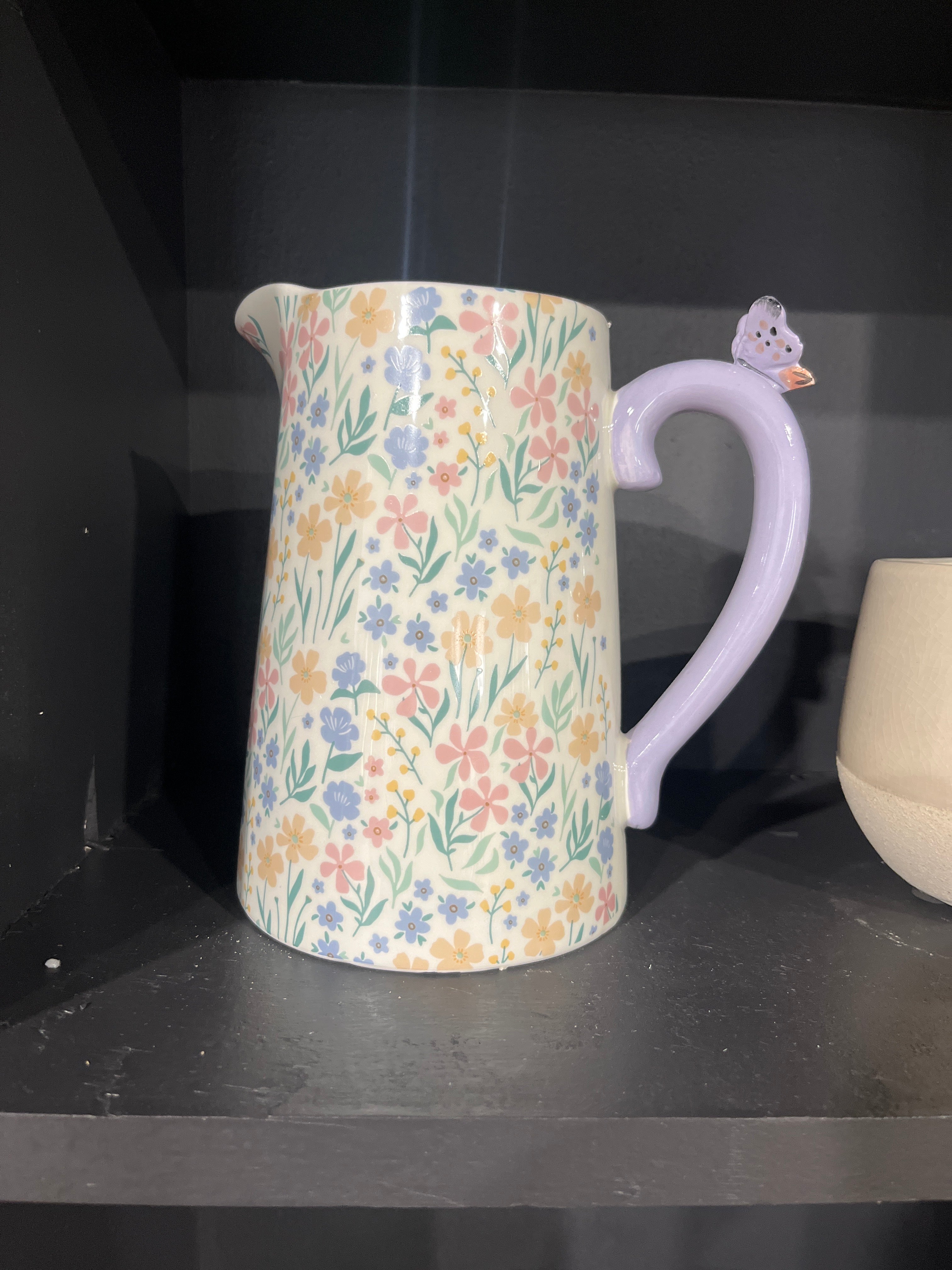 Purple floral ceramic pitcher