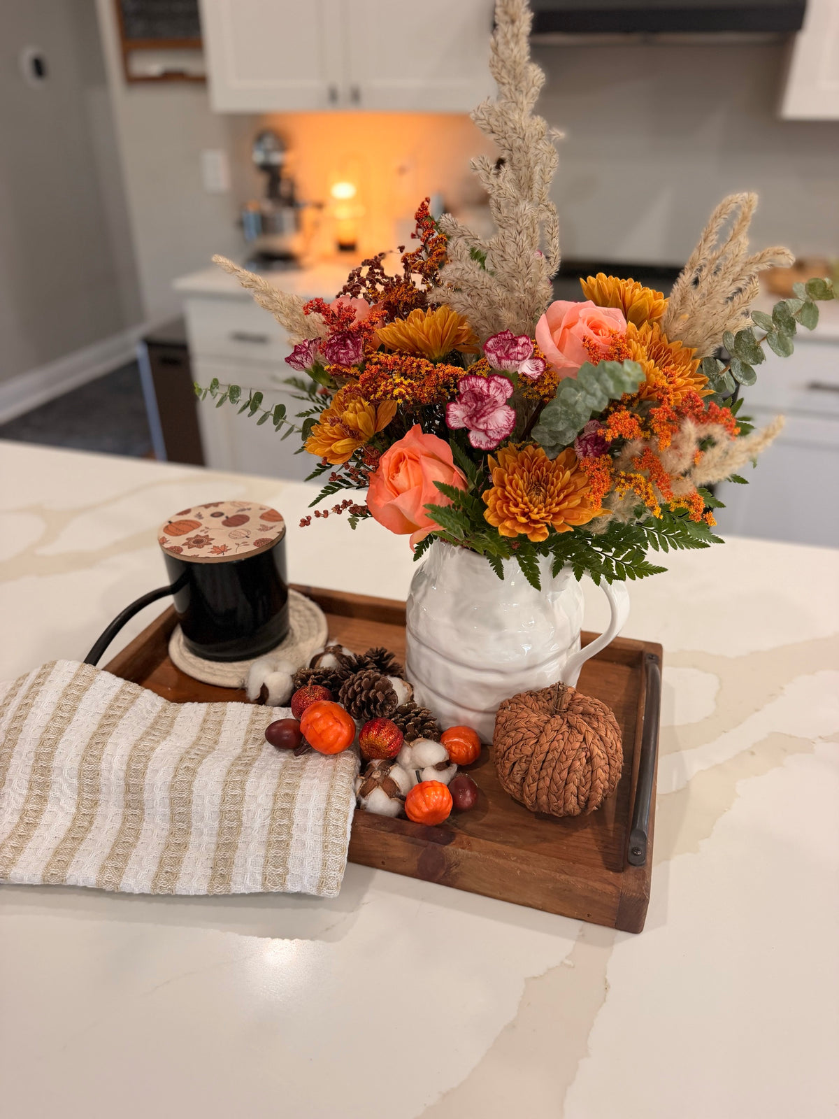Close view of Amber Fields styled in a white pitcher; vase and props not included
