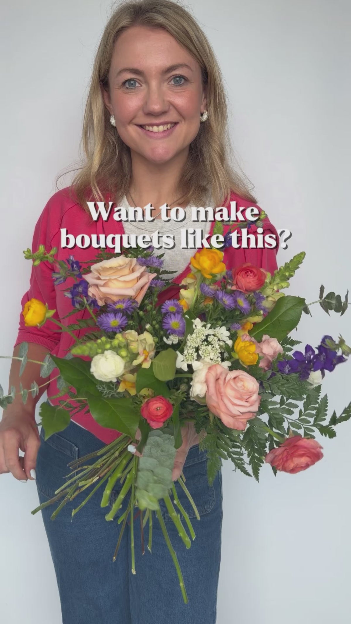 Load video: Alyssa holding a garden-inspired hand-tied bouquet in the online workshop preview