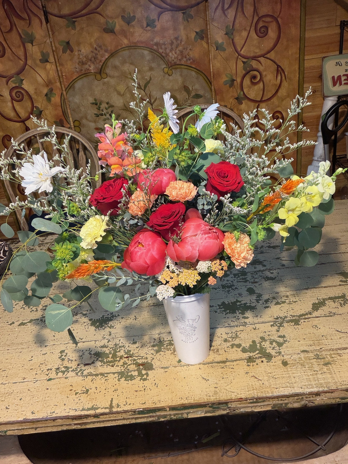Angel’s colorful prom bouquet, made after taking the Handheld Bouquet Workshop